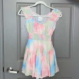 Isabelle’s cabinet pastel romper